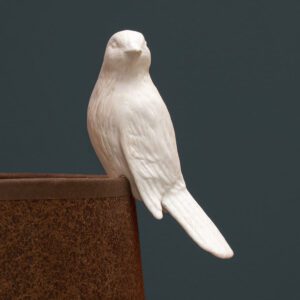 Canari décoratif en porcelaine blanche
